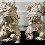 P14. Pair of blanc de Chine foo dogs. One in need of repair. 15&rdquo;h 